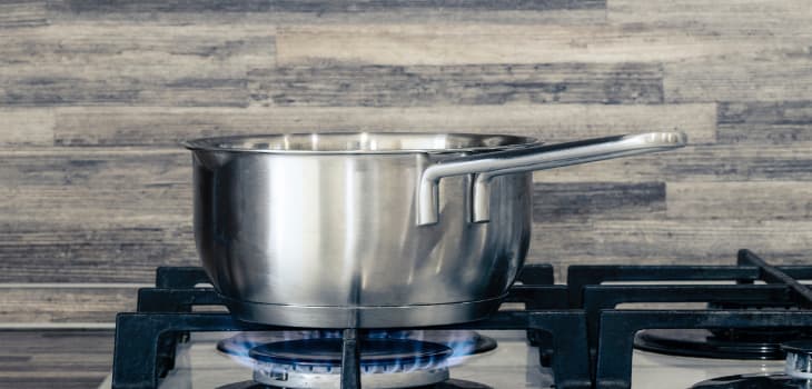 Pot cooking on hob