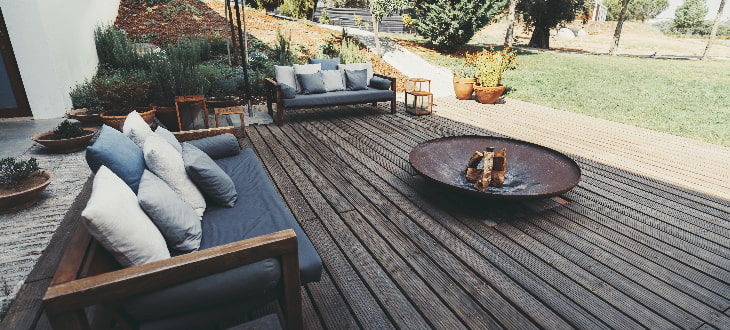 garden decking with matching furniture and firepit