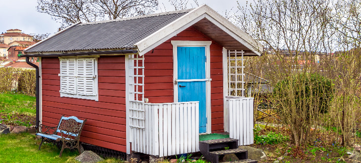 shed that is painted red, white and blue