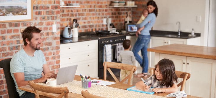 family in open plan kitchen