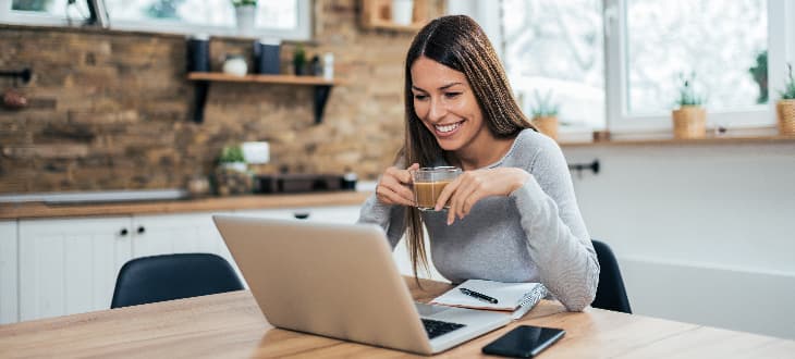 woman working in open plan kitchen