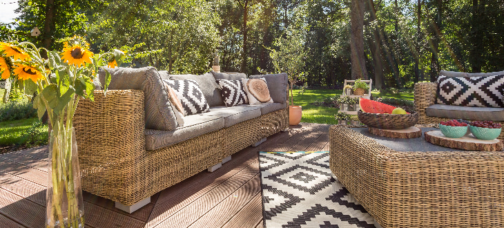 cosy garden decking with plants and trees