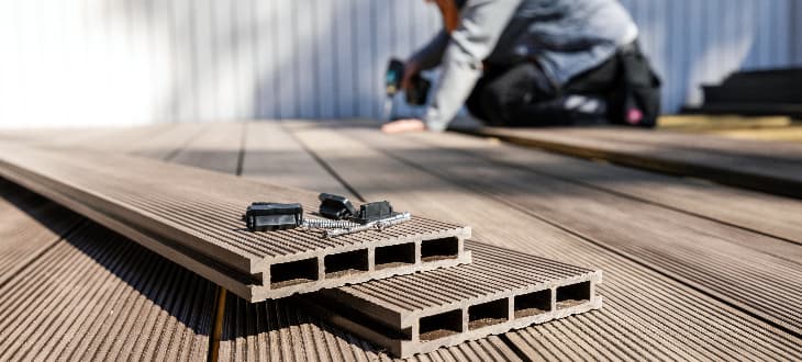 man repairing decking
