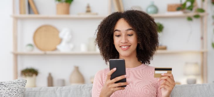 woman purchasing product on her mobile