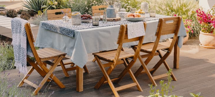foldable dining table and chairs on decking