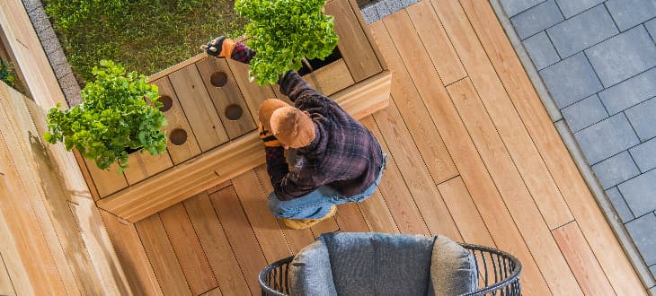 vertical plant pots in planter