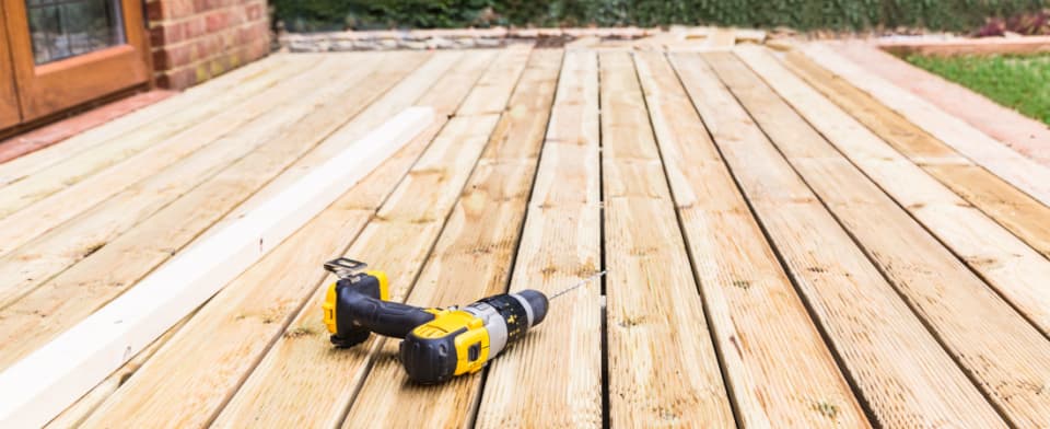 Drill on wooden decking
