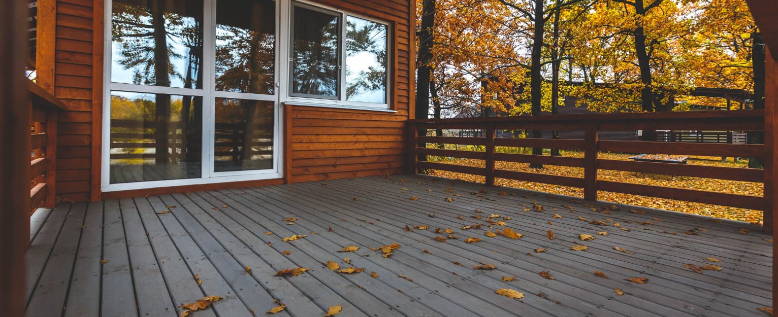 autumn leaves on garden decking