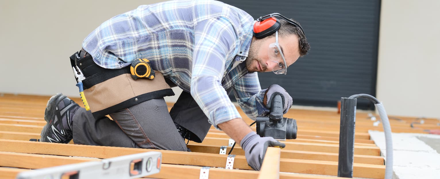 man building his decking
