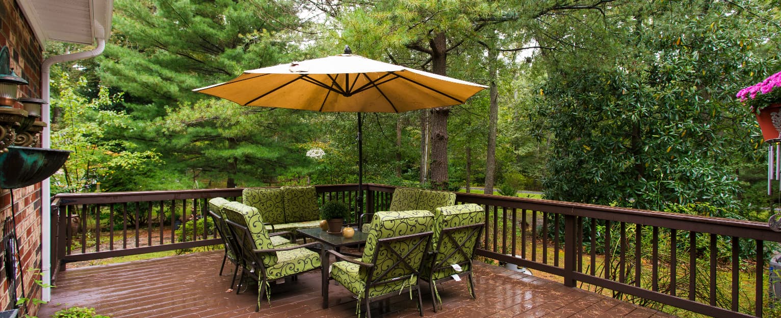 decking with furniture and trees